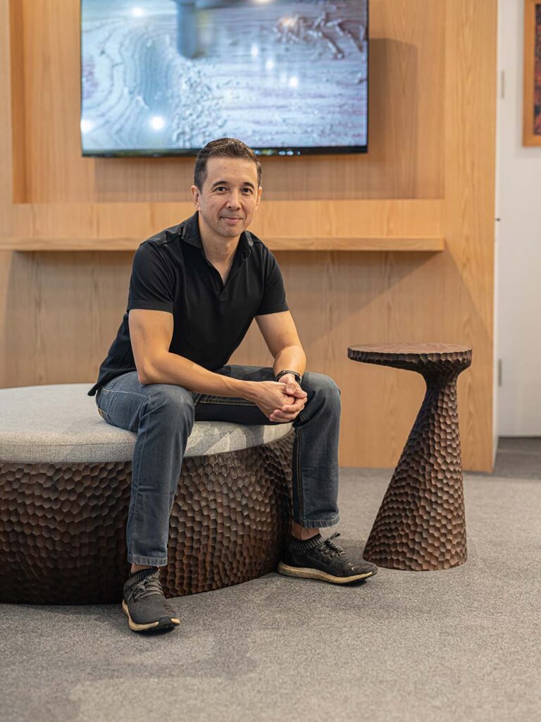 Jarrod Lim with his Kyon Ottoman and Side Table